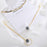 Grey Pearl Drop Gold Earrings
