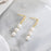 Long Drop Gold Pearl Earrings