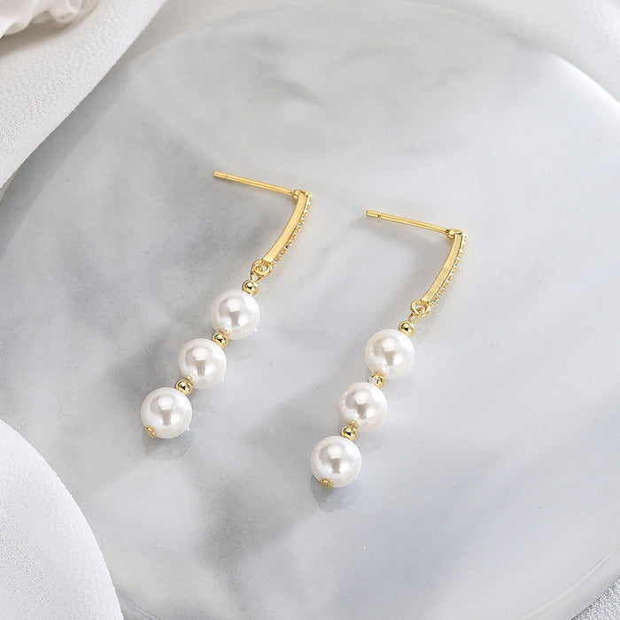 Long Drop Gold Pearl Earrings