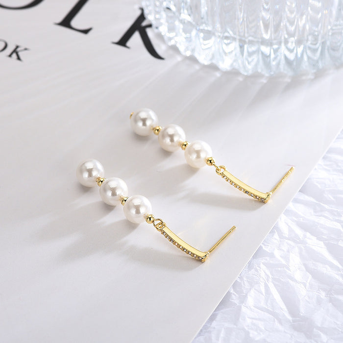 Long Drop Gold Pearl Earrings