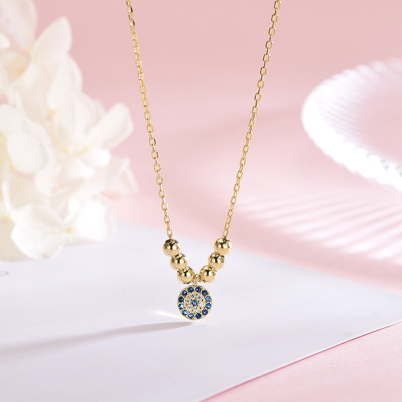 Gold Devil's Eye Pendant