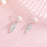 Pearl Literary Feather Earrings