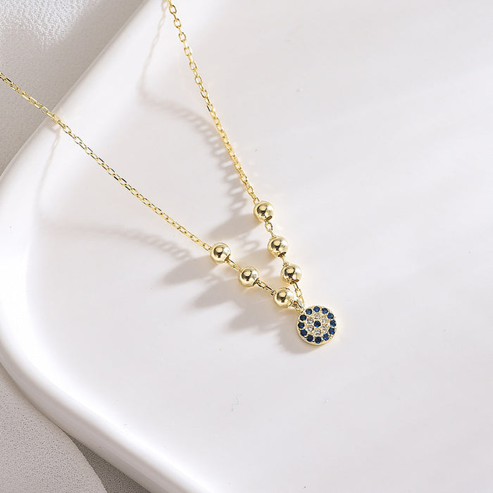 Gold Devil's Eye Pendant
